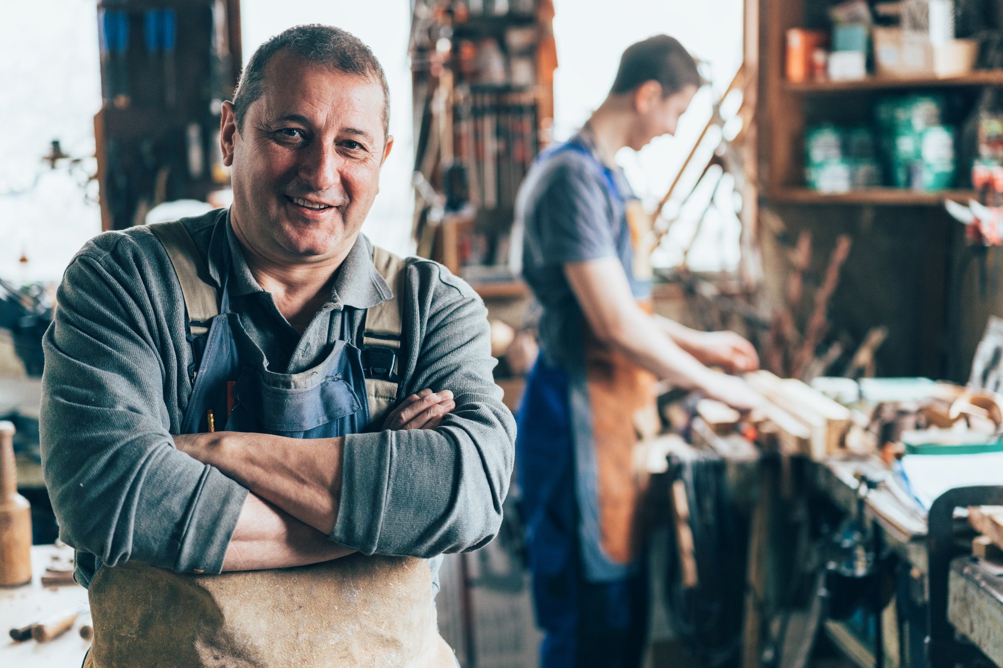 man with arms crossed iStock-1132123262
