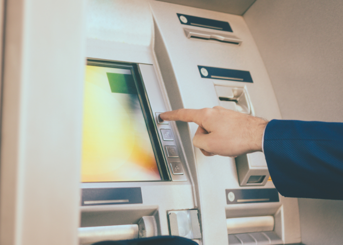 Person at ATM.