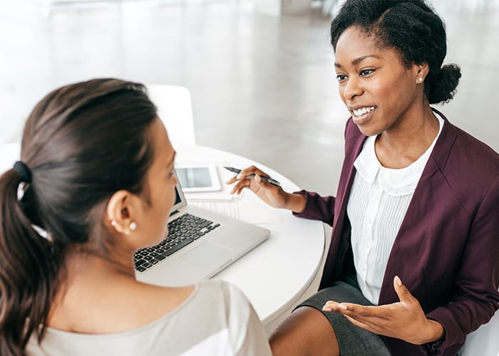 female-advisor-talking-to-customer