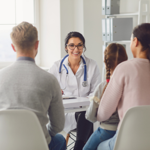 female-doctor-talks-to-family-hsa
