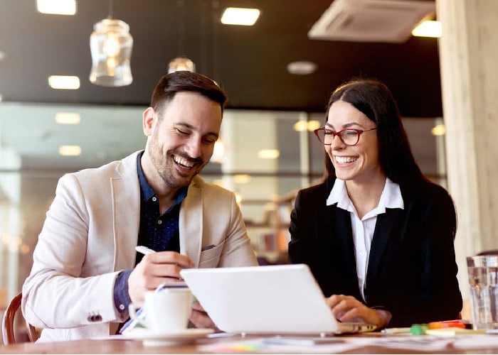man-woman-coffee-shop-laptop