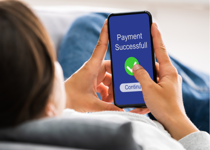 Payment successful message on mobile phone.